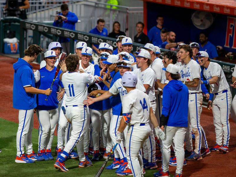 Florida infielder Brendan Lawson (11) hits his ninth homer of the season in the bottom of the sixth against FSU, March 10, 2026, at Condron Family Ballpark in Gainesville, Florida.The Gators beat the Seminoles 6-3. [Cyndi Chambers/ Gainesville Sun] 2026