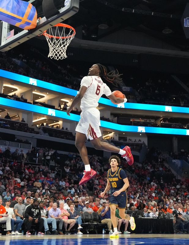 Mar 11, 2026; Charlotte, NC, USA; Florida State Seminoles guard Robert McCray V. (6) scores in the second half at Spectrum Center. Mandatory Credit: Bob Donnan-Imagn Images