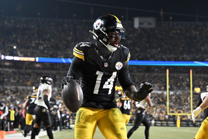 Jan 4, 2026; Pittsburgh, Pennsylvania, USA; Pittsburgh Steelers running back Kenneth Gainwell (14) rushes for a touchdown against the Baltimore Ravens during the second half at Acrisure Stadium. Mandatory Credit: Barry Reeger-Imagn Images
