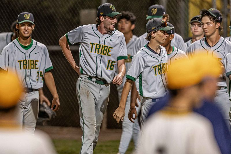 Ethan Trivison (16) lines up with teammates after his complete game allowing no runs as the Boca Raton Community High School Bobcats hosted the Jupiter Community High School Warriors in Florida High School Athletic Association boys' varsity baseball action at Boca Raton Community Middle School in Boca Raton, Fla., on March 11, 2026. The Warriors won 7-0.