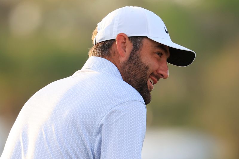 Scottie Scheffler smiles on the practice range during the first round of The Players Championship PGA golf tournament at TPC Sawgrass, Thursday, March 12, 2026, in Ponte Vedra Beach, Fla. [Corey Perrine/Florida Times-Union]