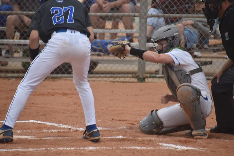 Destin catcher Landon Ullrich, a senior, tries to stop up the ball behind the plate. Ullrich had one hit in the Destin Sharks 7-6 win over Donelson Christian Academy of Nashville, Tennessee.