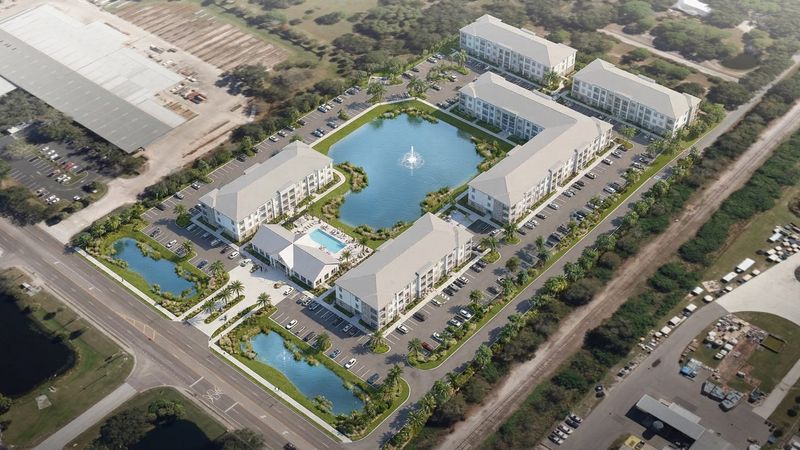 This rendering shows an aerial view of a 231-unit apartment complex that will be built by Indianapolis, Indiana-based developer Milhaus at 2750 Tallevast Road, near an Amazon Logistical Center. Provisions in the Live Local Act made it possible.