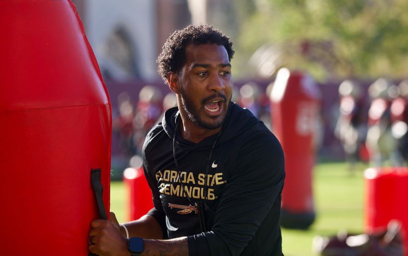 Running backs coach Kam Martin instructs players during a drill as Florida State football held a spring practice on Friday, March 13, 2026 at the Seminoles practice facility.
