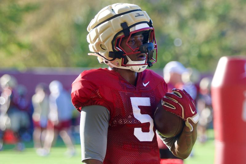 Running back Quintrevion Wisner prepares to run a drill as Florida State football held a spring practice on Friday, March 13, 2026 at the Seminoles practice facility.