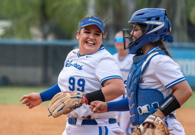 Wellington's Catalina Baronci, left, smiles at Angelina Baronci during their game on March 12, 2026, in Wellington, Florida.