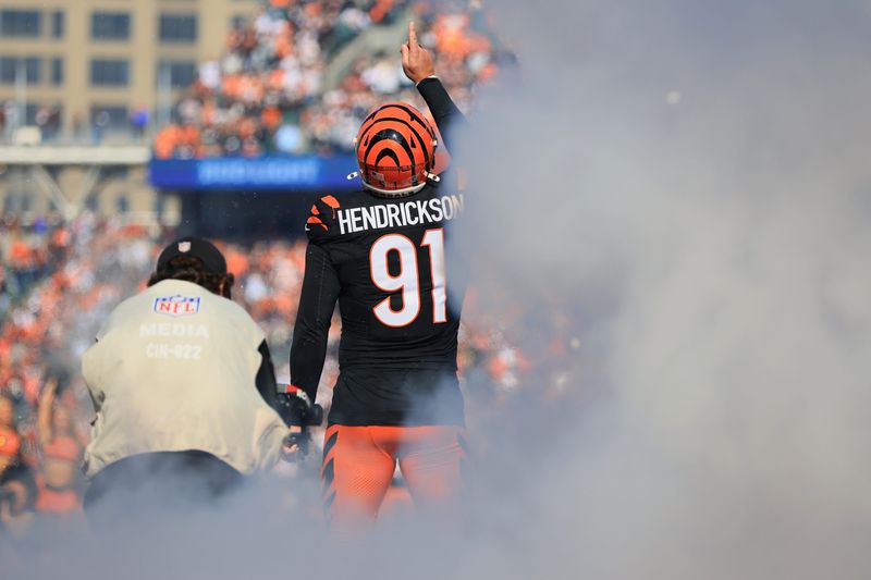 Oct 26, 2025; Cincinnati, Ohio, USA; Cincinnati Bengals defensive end Trey Hendrickson (91) runs out to the field before the game against the New York Jets at Paycor Stadium. Mandatory Credit: Katie Stratman-Imagn Images