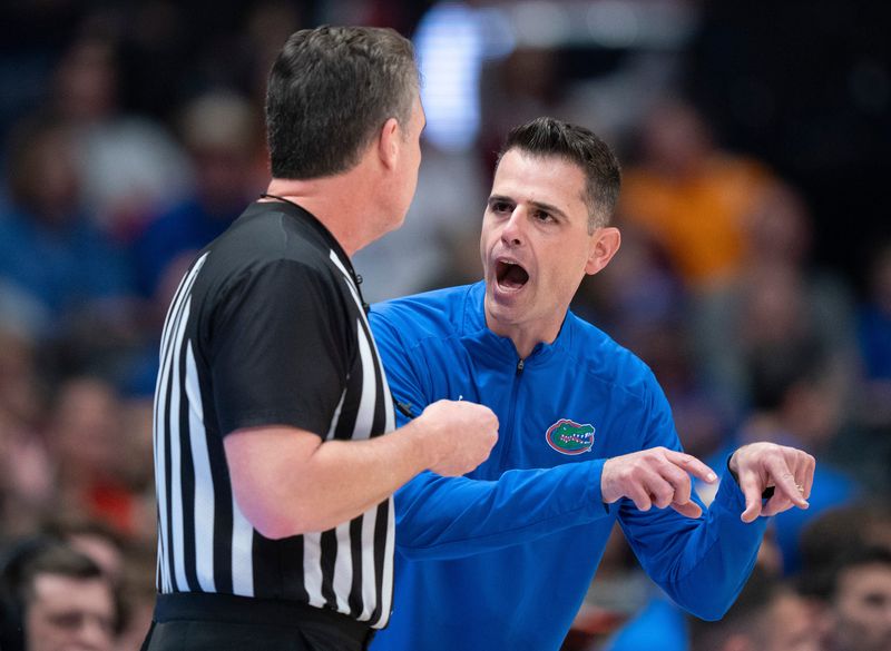 Florida coach Todd Golden has a discussion with a referee during their semifinal game of the 2026 SEC Men’s Basketball Tournament against Vanderbilt at Bridgestone Arena in Nashville, Tenn., Saturday, March 14, 2026.