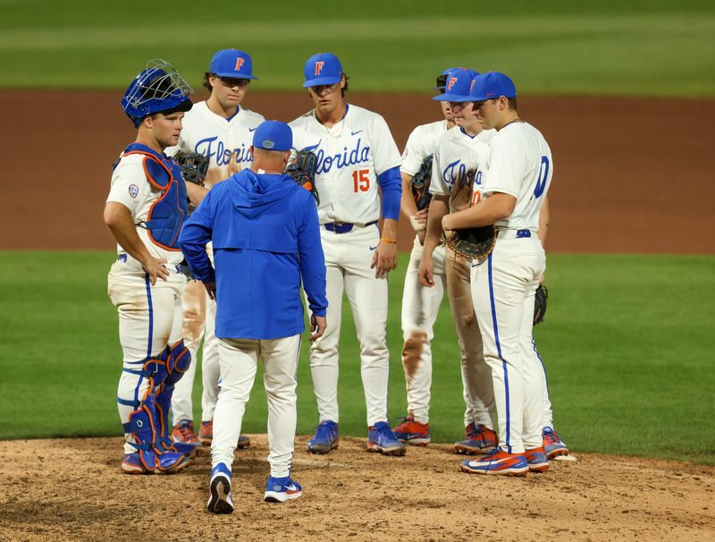 Florida head coach Kevin O'Sullivan has mound conference during an NCAA baseball game against South Carolina at Condron Ballpark in Gainesville, FL on Friday, March 13, 2026. [Alan Youngblood/Gainesville Sun]