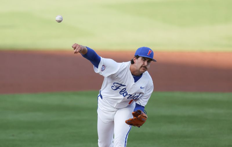 Florida pitcher Liam Peterson (12) pitches during an NCAA baseball game at Condron Ballpark in Gainesville, FL on Friday, March 13, 2026. [Alan Youngblood/Gainesville Sun]