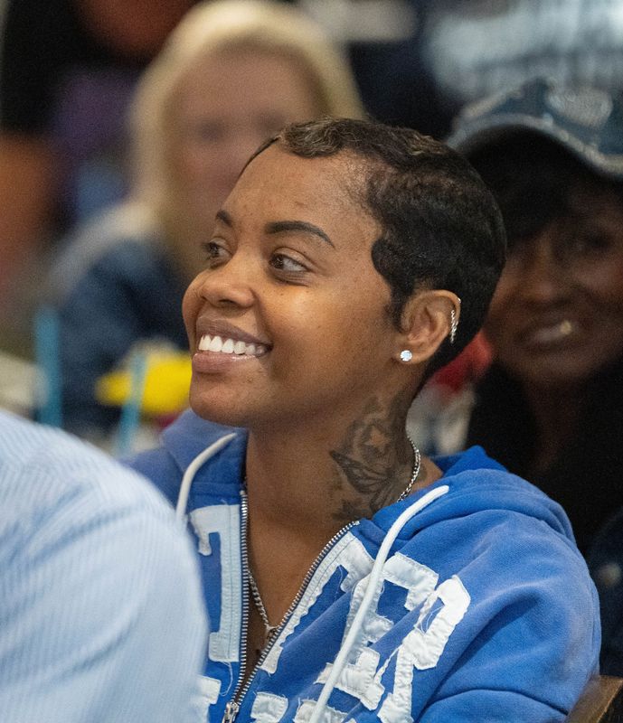 Keyla Richardson, center, watches her performance from last week’s "American Idol" program during a watch party at Andy D's restaurant in Pensacola on March 16, 2026. Richardson’s performance in the current round - which will be open for viewer voting - will appear on next week’s show.
