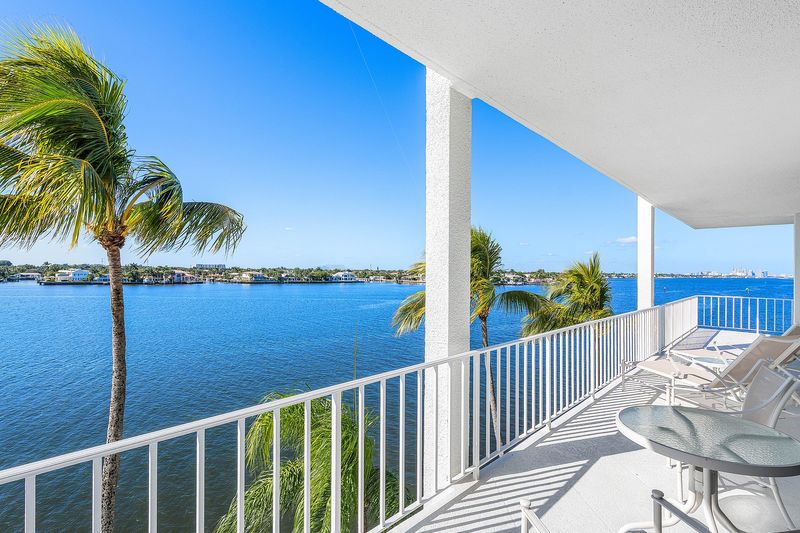The balcony of Tower Vallandry's unit No. 15 on Ibis Isle offers wide views of the Intracoastal Watersay and homes to the west.