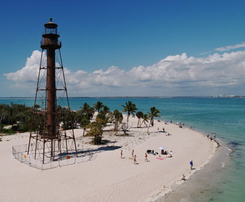 Visitors to S.W. Florida took advantage of the beautiful weather Friday, March 13, 2026, as they flocked to Lighthouse Beach on Sanibel.