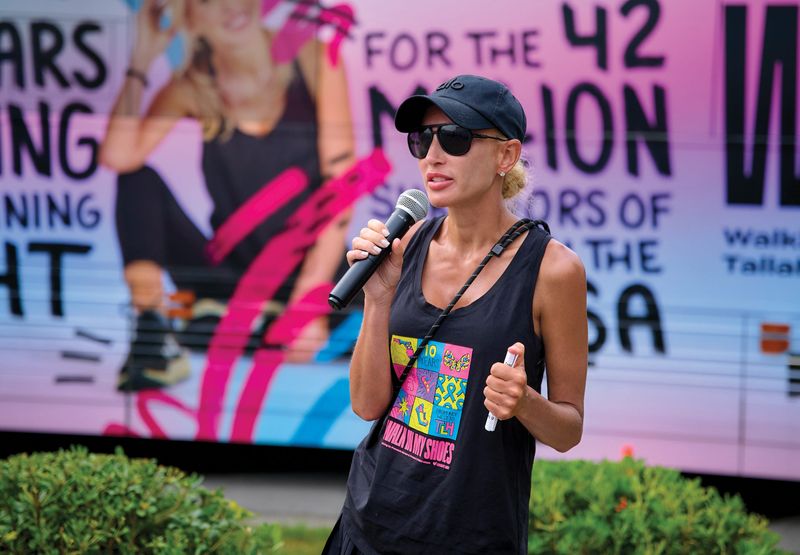 Former state Sen. Lauren Book is shown here speaking to a gathering along 2025's "Walk in My Shoes," an annual 1,500-mile awareness and advocacy walk across Florida that Book's foundation, Lauren's Kids, organizes to educate more about childhood sexual abuse.