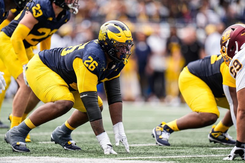 Michigan defensive lineman Rayshaun Benny (26) gets ready for a play against Central Michigan during the second half at Michigan Stadium in Ann Arbor on Saturday, Sept. 13, 2025.