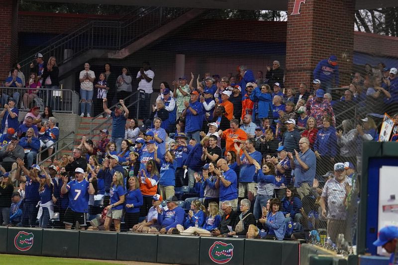 Florida fans cheer as the team takes on Tennessee during an NCAA softball game at Katie Seashole Pressly Stadium in Gainesville, FL on Friday, March 20, 2026. Tennessee beat Florida 2-1 [Morgan Hurd/Gainesville Sun]
