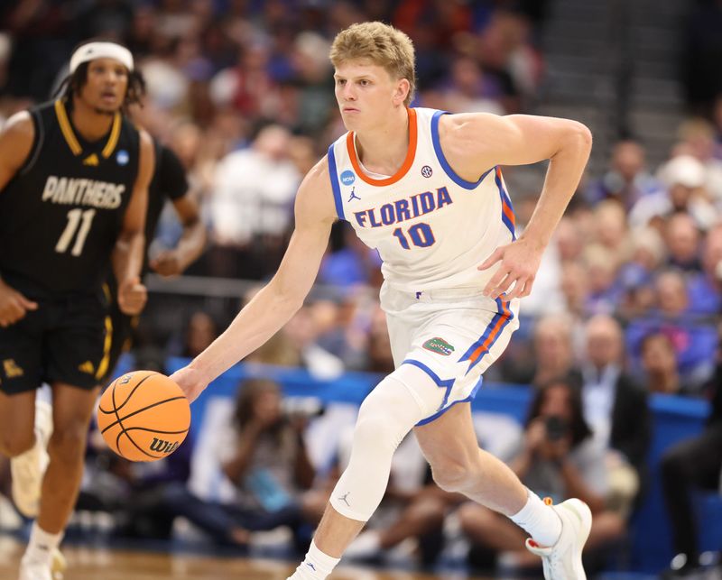 Florida forward Thomas Haugh (10) drives during the NCAA March Madness opening round at Benchmark international Arena in Tampa, FL on Friday, March 20, 2026. [Alan Youngblood/Gainesville Sun]