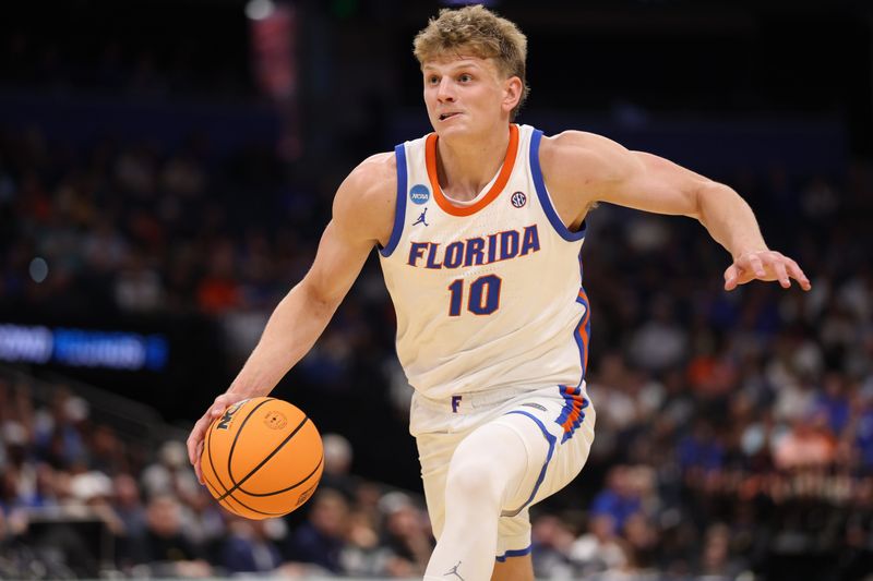 Mar 20, 2026; Tampa, FL, USA; Florida Gators forward Thomas Haugh (10) drives the ball in the first half against the Prairie View A&M Panthers during a first round game of the men's 2026 NCAA Tournament at Benchmark International Arena. Mandatory Credit: Nathan Ray Seebeck-Imagn Images
