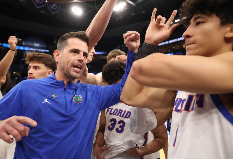 Florida head coach Todd Golden celebrates their 114-55 win over Prairie View A&M during the NCAA March Madness opening round at Benchmark international Arena in Tampa, FL on Friday, March 20, 2026. [Alan Youngblood/Gainesville Sun]