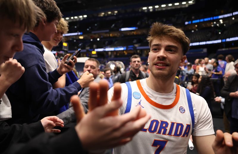 Florida guard Urban Klavzar (7) greets fans after Florida’s 114-55 win over Prairie View A&M of the NCAA March Madness opening round at Benchmark international Arena in Tampa, FL on Friday, March 20, 2026. [Alan Youngblood/Gainesville Sun]