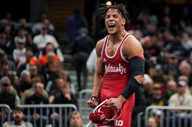 Mar 20, 2026; Cleveland, OH, USA; Nebraska Cornhuskers Christopher Minto reacts after competing against Missouri Tigers Cam Steed during the NCAA DI Wrestling Championship at Rocket Arena. Mandatory Credit: Aaron Doster-Imagn Images