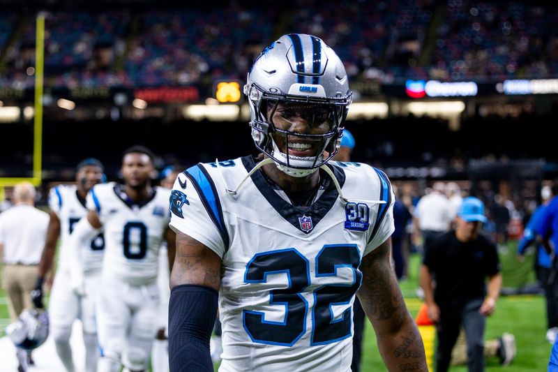 Sep 8, 2024; New Orleans, Louisiana, USA; Carolina Panthers cornerback Lonnie Johnson Jr. (32) walks off the field before the game against the New Orleans Saints at Caesars Superdome. Mandatory Credit: Stephen Lew-Imagn Images