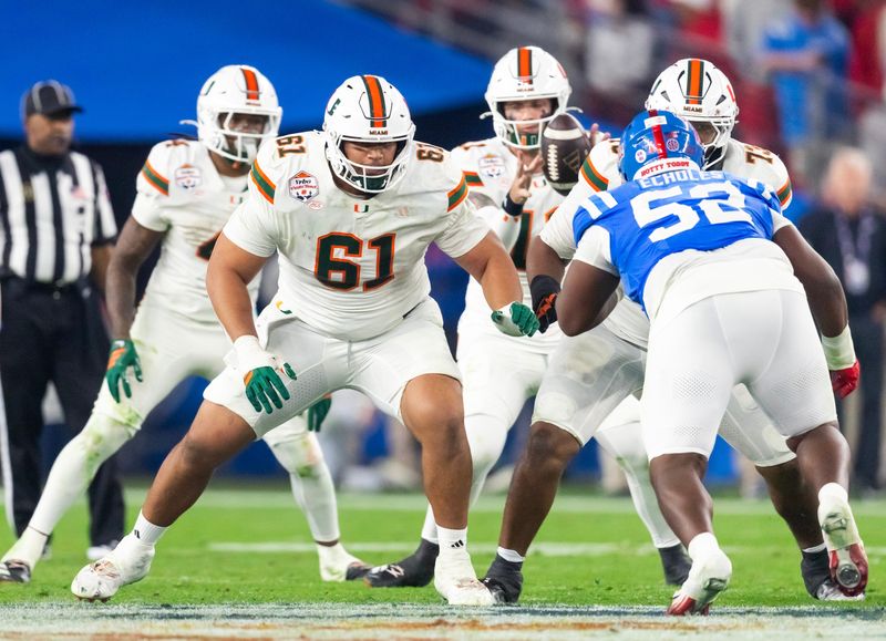 Jan 8, 2026; Glendale, AZ, USA; Miami Hurricanes offensive lineman Francis Mauigoa (61) against the Mississippi Rebels during the 2026 Fiesta Bowl and semifinal game of the College Football Playoff at State Farm Stadium. Mandatory Credit: Mark J. Rebilas-Imagn Images
