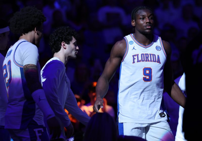 Mar 22, 2026; Tampa, FL, USA; Florida Gators center Rueben Chinyelu (9) is introduced against the Iowa Hawkeyes prior to a second round game of the men's 2026 NCAA Tournament at Benchmark International Arena. Mandatory Credit: Matt Pendleton-Imagn Images