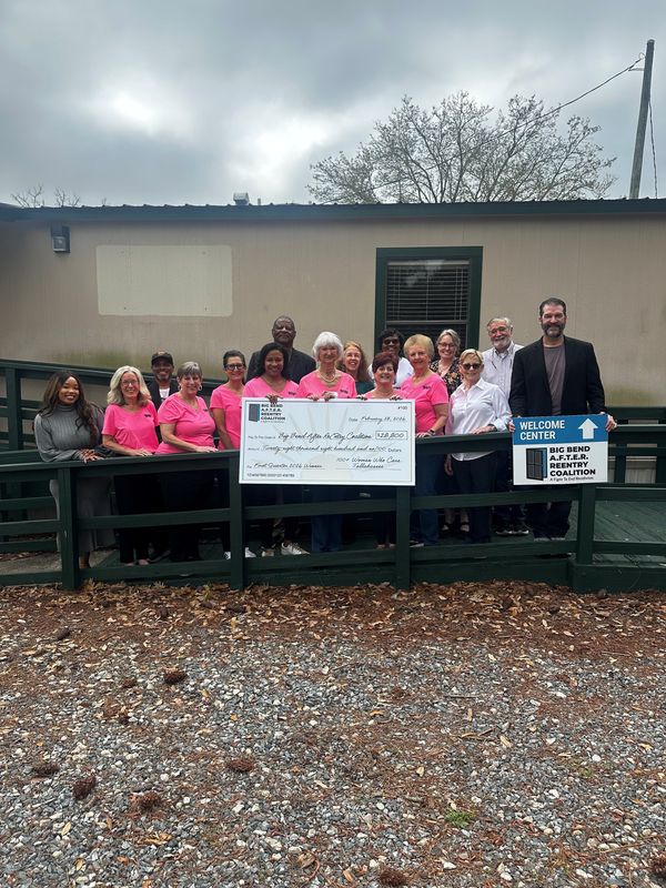 100 Women Who Care/Tallahassee presented a check for $28,800 to the members of the Board, volunteers and staff of the Big Bend After Reentry Coalition for March 2026.