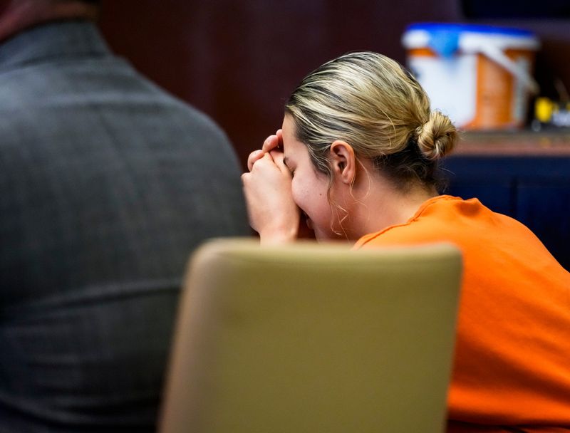 Genise Taylor places her head in her hands as Judge Deborah Cunningham decides Taylor will be held without bond during a pretrial hearing at the Collier County Courthouse in Naples, Fla., on Monday, March 23, 2026. Taylor faces one count of DUI manslaughter.