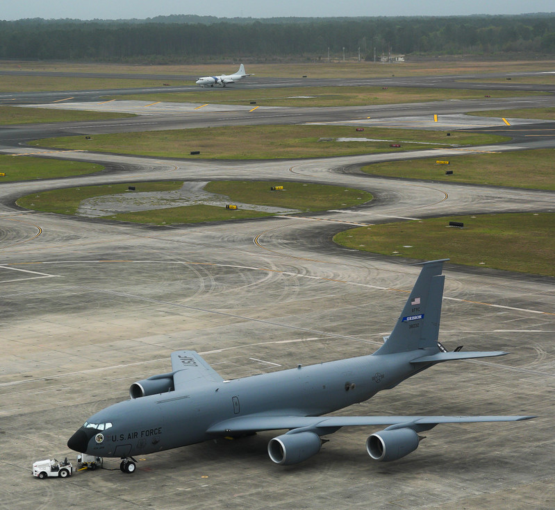 A U.S. Customs aircraft taxis on the runway after landing as a Boeing KC-135 sits on the tarmac at Jacksonville Aviation Authority’s Cecil Airport Tuesday March 24, 2026 in Jacksonville, Fla. [Doug Engle/Florida Times-Union]
