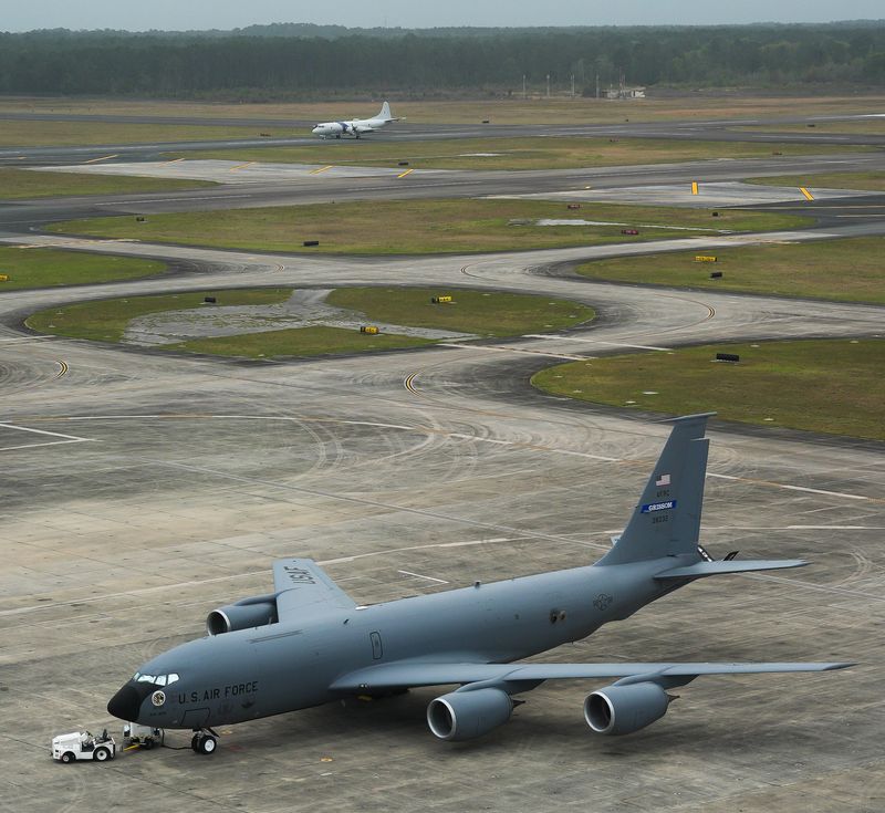 A U.S. Customs aircraft taxis on the runway after landing as a Boeing KC-135 sits on the tarmac at Jacksonville Aviation Authority’s Cecil Airport Tuesday March 24, 2026 in Jacksonville, Fla. [Doug Engle/Florida Times-Union]