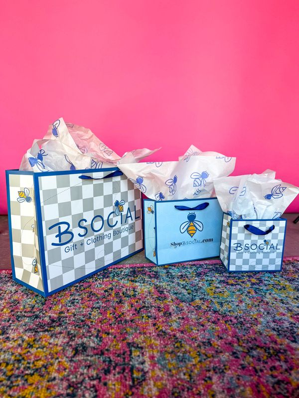 Brittney Patty owner of B Social Gift +Clothing Boutique underscores the importance of branding, from her B social signature (her handwriting) to her bumble bee mascot on reusable shopping bags, “our walking billboards,” that also include the inspirational biblical psalm, “You are fearfully and wonderfully made.”