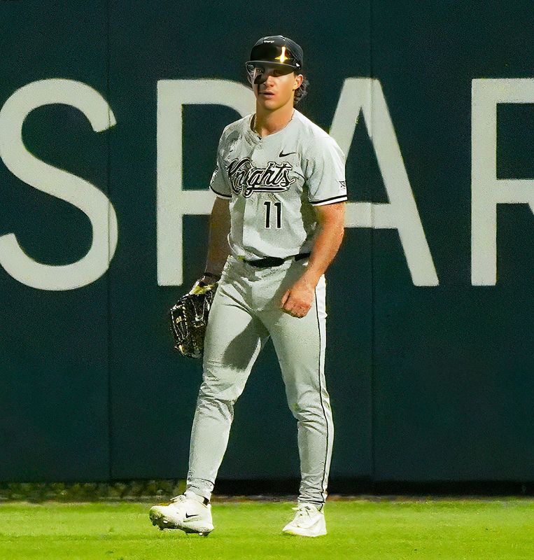 UCF’s Andrew Williamson (11) looks on towards the infield during a game against Stetson, Tuesday, March 24, 2026, at Melching Field in DeLand.