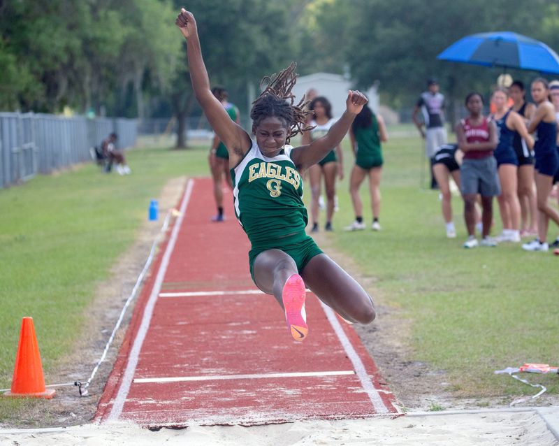 George Jenkins junior Michaelah Williams sets a personal record in the long jump on Tuesday at the Lakeland City Meet at Tenoroc High School.