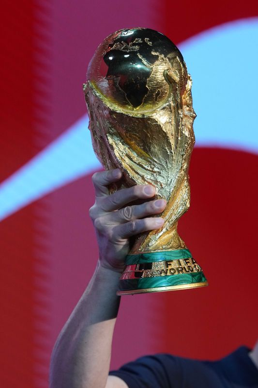 Mar 24, 2026; Los Angeles, CA, USA; Italian former footballer Alessandro Del Piero holds the FIFA World Cup trophy during the FIFA World Cup 26 Trophy Tour by Coca-Cola at The Coke Studio at LA Live. Mandatory Credit: Kirby Lee-Imagn Images