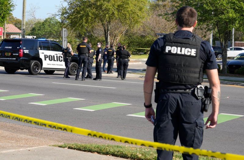 Pensacola Police officers respond to an officer involved-shooting near the downtown Pensacola Starbucks on Thursday, March 26, 2026.