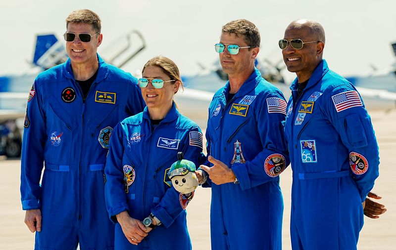 The crew of Artemis II (mission specialists Jeremy Hansen and Christina Koch, Commander Reid Wiseman and Pilot Victor Glover) pose for photos with their Zero-G Indicator named “Rise” after their arrival at Kennedy Space Center, FL March 27, 2026 They are scheduled to launch on a 10-day mission to fly around the moon and back as soon as April 1. Craig Bailey, FLORIDA TODAY via USA TODAY NETWORK