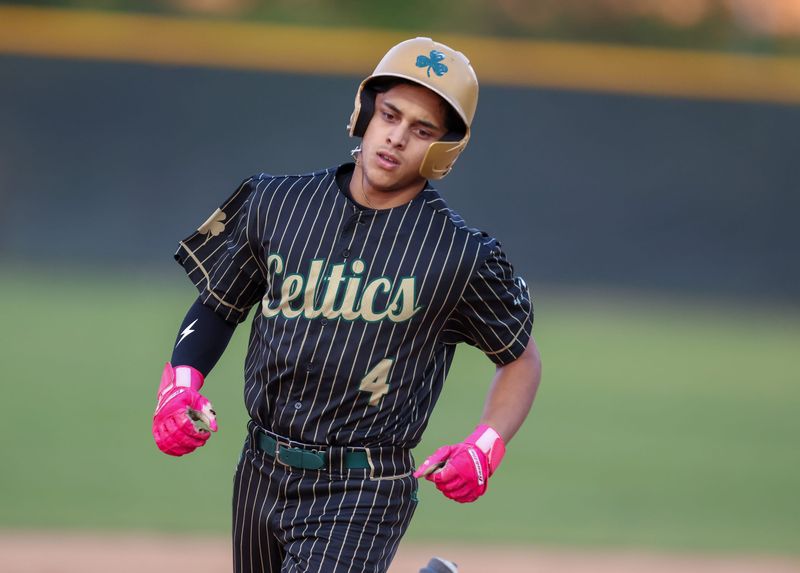 Trinity Catholic Nate Colon (4) rounds second on his three run home run during an FHSAA baseball game at Trinity Catholic in Ocala, FL on Friday, March 27, 2026. Trinity beat Forest 10-0. [Alan Youngblood/Gainesville Sun]
