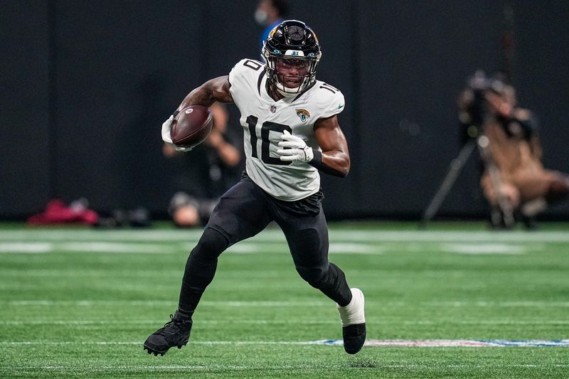 Aug 27, 2022; Atlanta, Georgia, USA; Jacksonville Jaguars wide receiver Laviska Shenault Jr. (10) runs after a catch against the Atlanta Falcons during the first half at Mercedes-Benz Stadium. Mandatory Credit: Dale Zanine-USA TODAY Sports