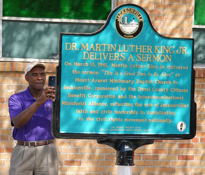 Retired Senator Tony Hill takes a picture of the first of 40 markers for the U.S. Civil Rights Trail at Mt. Ararat Baptist Church at 2503 N. Myrtle St., Monday afternoon March 30, 2026 in Jacksonville, Fla. The marker shows that on March 19, 1961, the Rev. Martin Luther King Jr. delivered a sermon titled "It's a Great Time to be Alive" at the church. The U.S. Civil Rights Trail will add 39 more markers at places where the national civil rights movement unfolded in Jacksonville. [Doug Engle/Florida Times-Union]