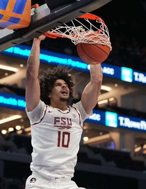 Mar 11, 2026; Charlotte, NC, USA; Florida State Seminoles guard Lajae Jones (10) scores in the second half at Spectrum Center. Mandatory Credit: Bob Donnan-Imagn Images