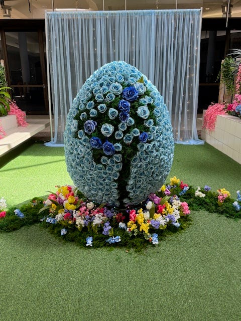 Sharon Daniel created the Blooming Bloo Rose Egg Experience at Lake Square Mall in Leesburg. Along with her flower-arranging artistic talents, she works at the mall.