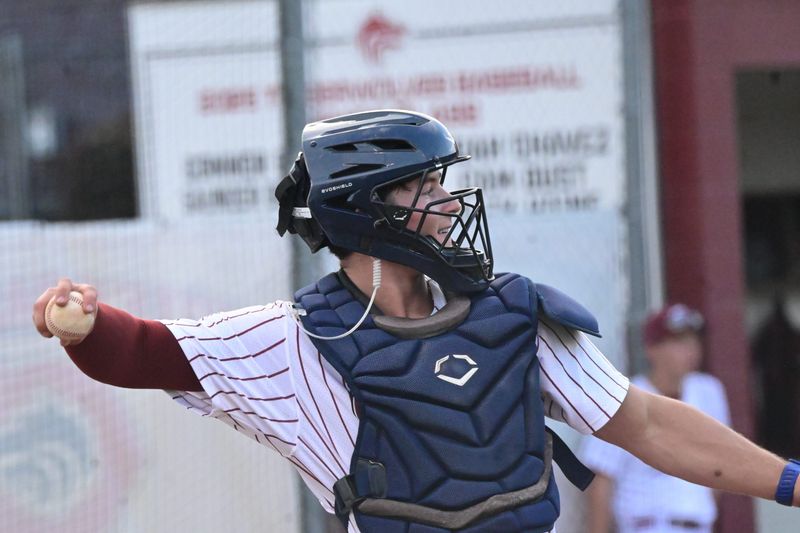 Chiles' catcher Saunder Dinkelman, attempts to toss the ball to his pitcher. The Lawton Chiles Timberwolves hosted the Houston County Bears in a Florida-Georgia high school baseball game on Dick Steed Field in Tallahassee, Florida, on Wednesday, April 1, 2026.