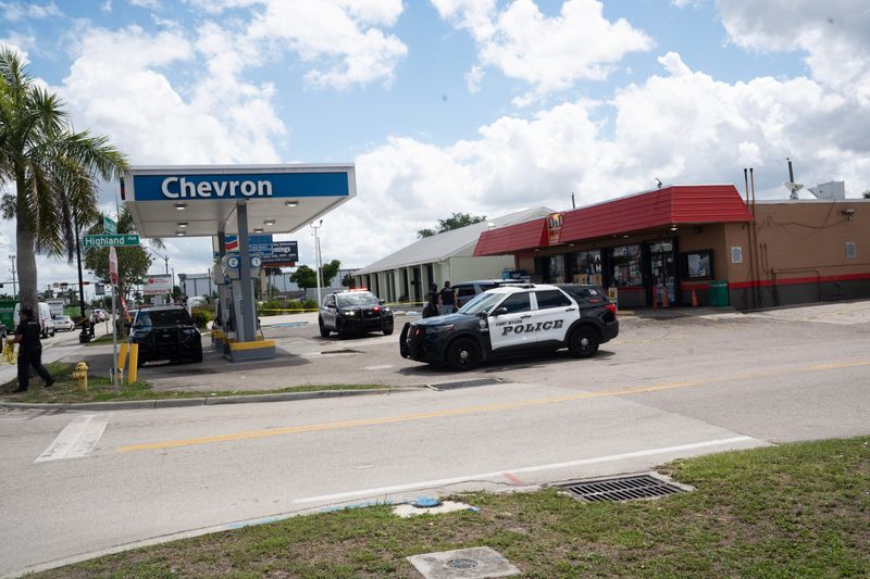 Members of the Fort Myers Police Department work the scene of a homicide at a convenience store on Martin Luther King Jr. Boulevard in Fort Myers on Thursday, April 2, 2026.