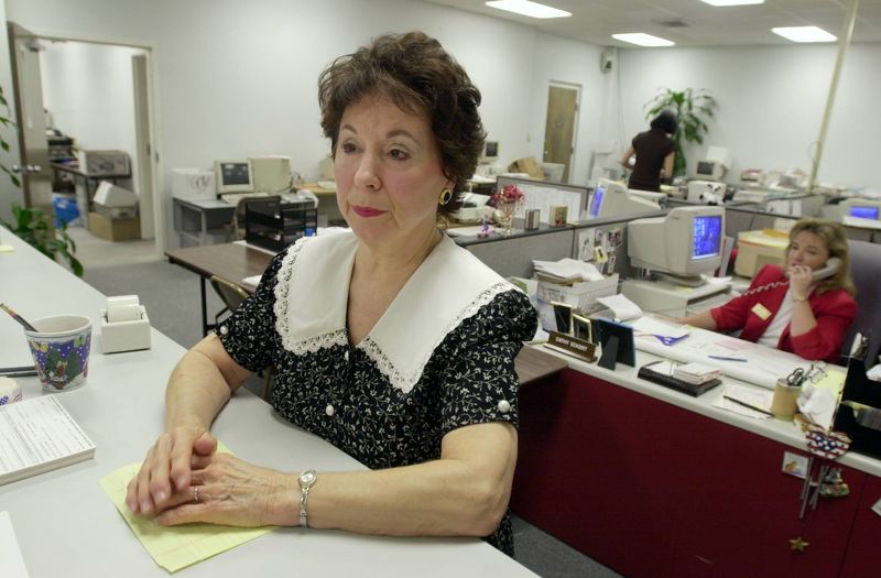 Polk County Supervisor of Elections Helen Gienau is seen answering questions about the 2000 presidential election at the county elections office in Bartow. Gienau, who held the position for 24 years, died March 31 at age 98.