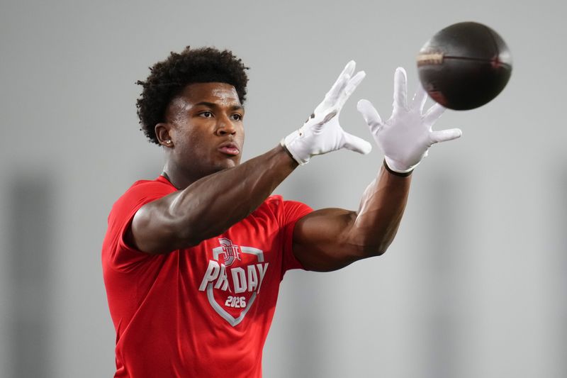 Ohio State Buckeyes defensive back Caleb Downs catches a ball during Pro Day for NFL scouts at the Woody Hayes Athletics Center on March 25, 2026.