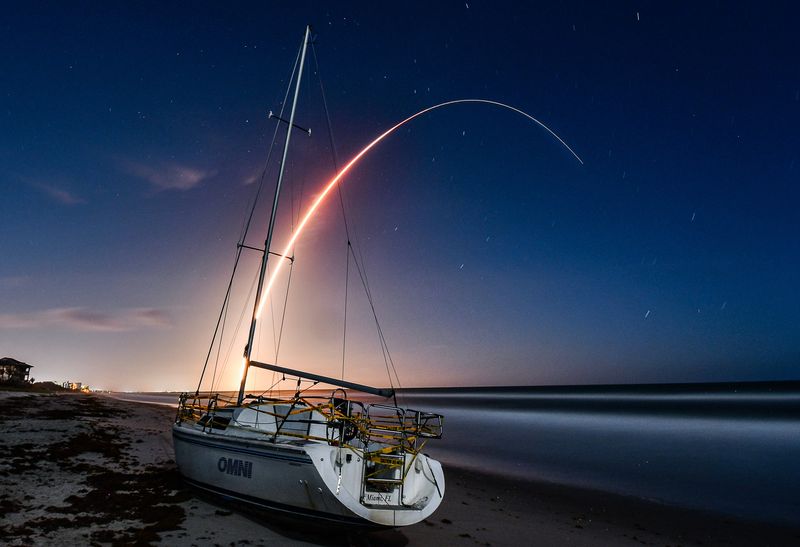 A United Launch Alliance Atlas V rocket carrying 29 Amazon Leo broadband satellites launched at 1:46 a.m. EST on Saturday, April 4 from Launch Complex 41 at Cape Canaveral Space force Station. A sailboat that beached Saturday March 28 in Satellite beach just north of Sunrise Ave. sits in the foreground.