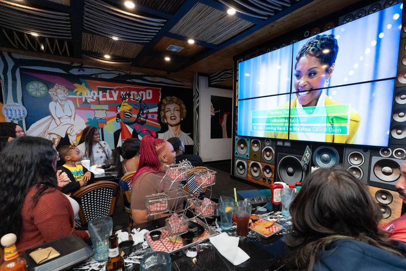 Family and friends gather to watch Keyla Richardson perform on American Idol during a watch party at Margarita’s Fusion Restaurant & Bar in Pensacola on April 6, 2026.
