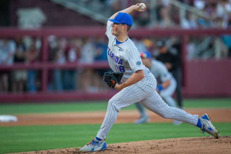 Florida Gators pitcher Cooper Walls (38) pitches to a batter. The Florida State Seminoles hosted the Florida Gators at Dick Howser Stadium on Tuesday, April 7, 2026.